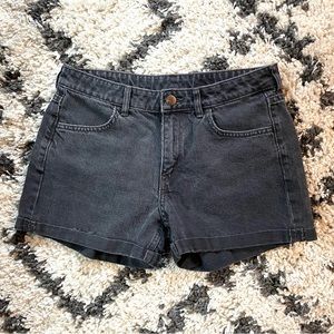 Denim shorts, size 6. Soft black denim. Cuffed bottoms. Regular rise.